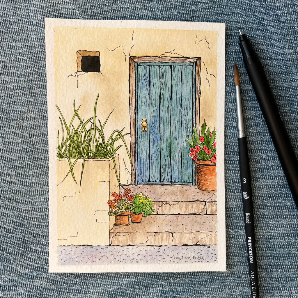 Geraniums and blue door