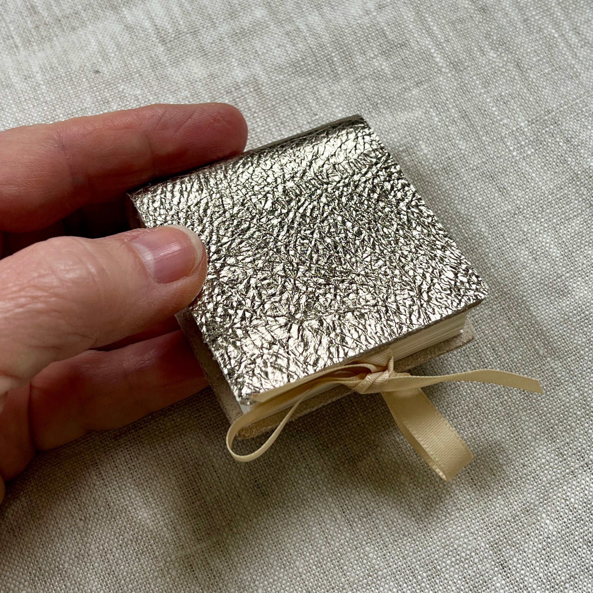 Square handmade mini journal in printed metallic genuine leather - blank pages